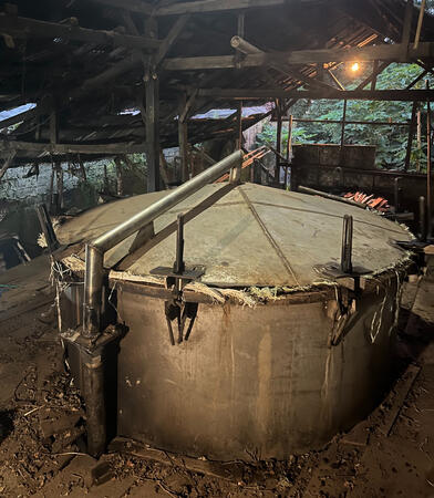 a stainless steel vat for distillation